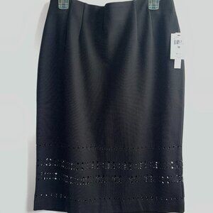 NWT Amanda + Chelsea black skirt size 10 stretch cutouts